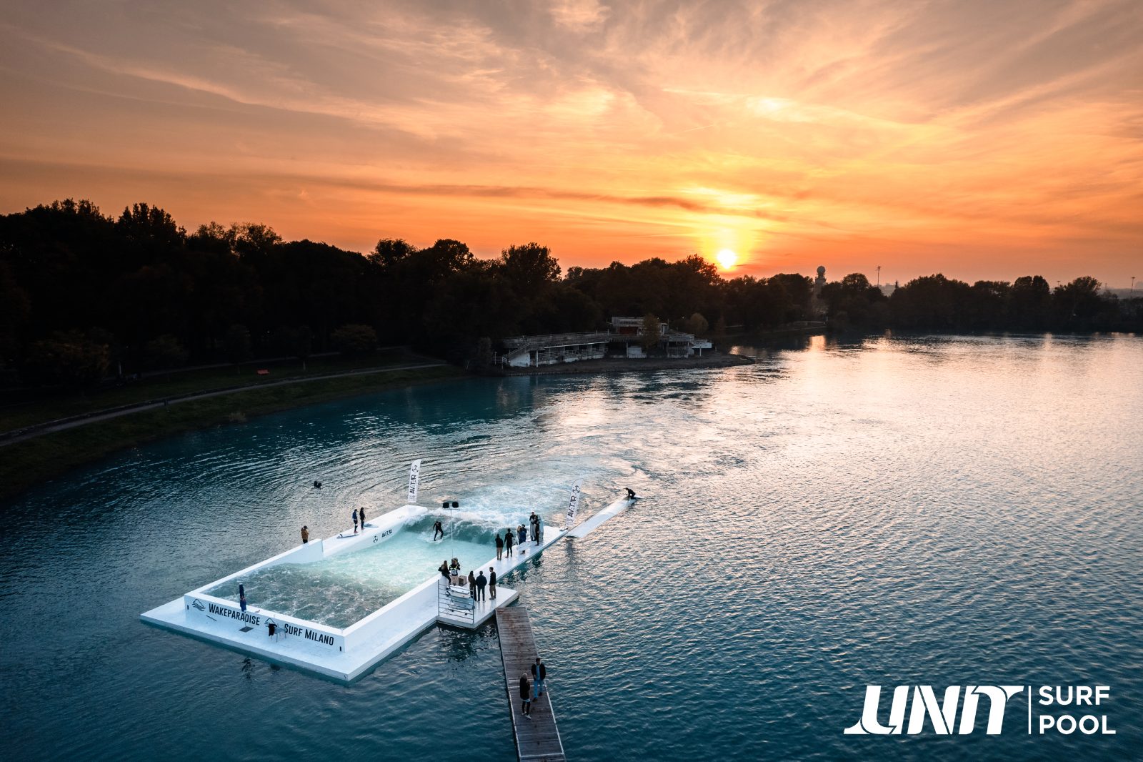 UNIT Surf Pool floating standing-wave at sunset