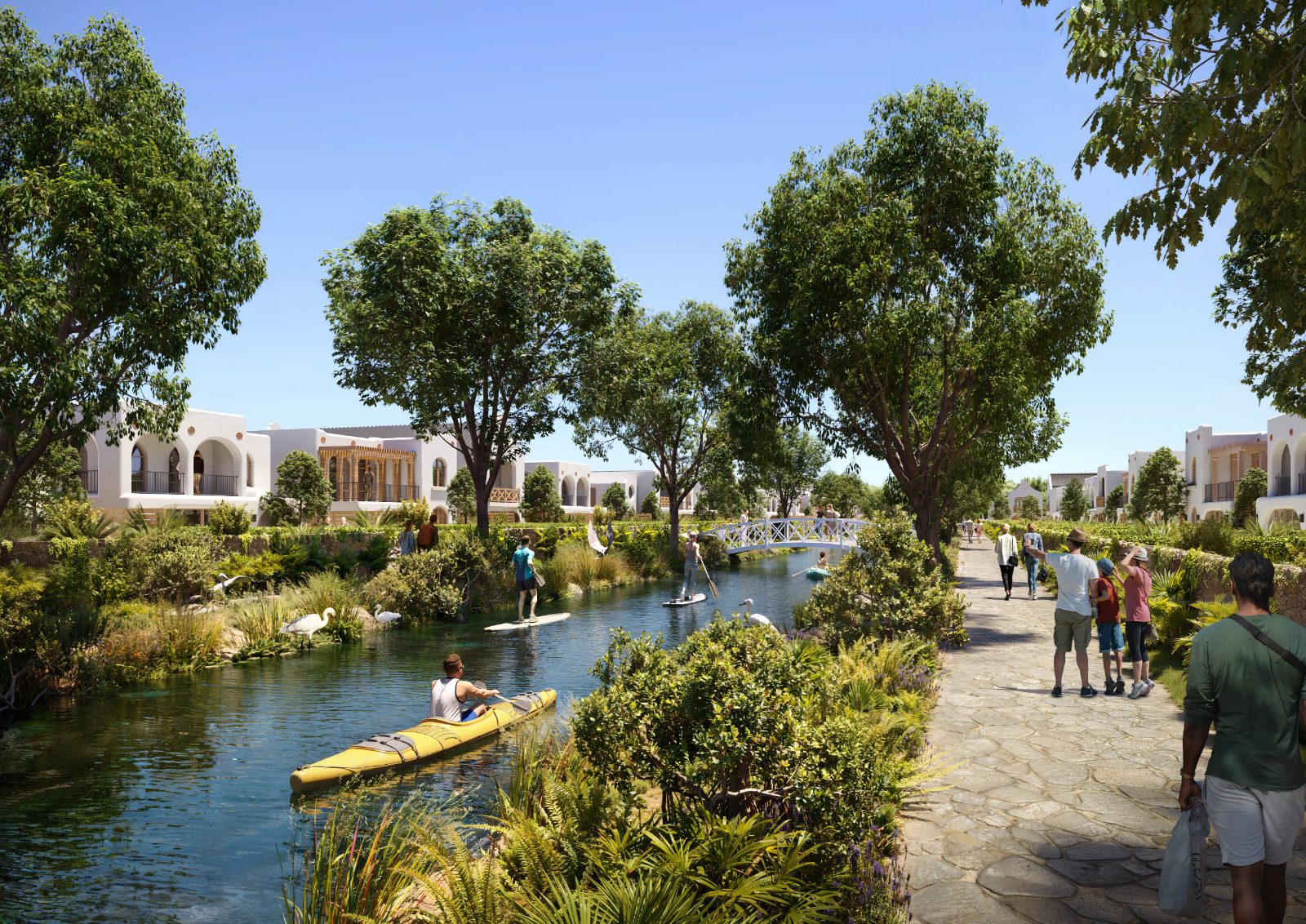 Canal-side residences and walking paths at Koa Bay